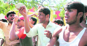 Telangana supporters clash with the police during a protest in Hyderabad on Thursday.