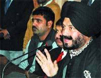 MS Bitta addresses a press conference in Jalandhar on Thursday