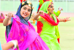 Students rehearse for the 60th Senior National Basketball Championship to be held in Ludhiana. 