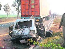 The mangled remains of a car involved in an accident near Tangra village on the Amritsar-Jalandhar GT Road on Thursday. 