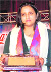 Aradhana being honoured at a function in Government College, Sector 46, Chandigarh, on Friday.
