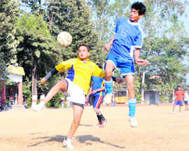 A match of the Khadag Bahadur Memorial Football Tournament in progress in Dehradun on Friday.