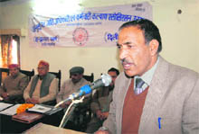 A speaker at the SC Officers and Employees Welfare Association meeting in Dehradun on Friday. 