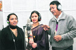 Om Gairola with Vastika and Sangeeta at the recording of the Garhwali song album Bhondu in Dehradun on Friday.