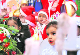 Children of Kiddies Paradise School celebrate Christmas in Ludhiana on Friday.