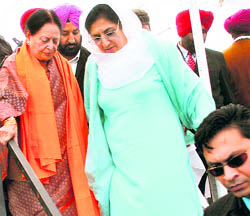 All-India Congress Committee general secretary Mohsina Kidwai and Rajinder Kaur Bhattal come out of the conference of the Congress at the Jor Mela on Friday