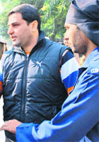 Walid comes out of the district courts in Chandigarh on Saturday
