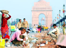 R-day preparationsLabourers at work for Republic Day celebrations at the Rajpath in New Delhi on Saturday. 