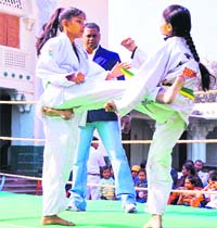Girls participate in the second National All-Style Martial Art Championship in Dehradun 
