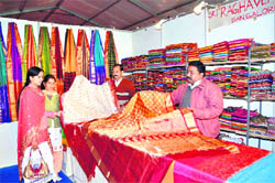 A stall selling Mysore silk saris at the National Handloom Expo in Dehradun on Saturday. A Tribune photograph