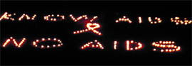 Fancy lights display a slogan in connection with the AIDS awareness campaign at Dharamsala on Saturday