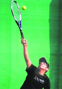 A player in action during the U-19 Gymkhana Lawn Tennis Tournament at Gymkhana Club, Sector 6, in Panchkula