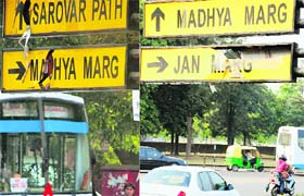 Damaged signboards located at Matka Chowk on Madhya Marg; and on the roundabout of Sectors 7-8 in Chandigarh