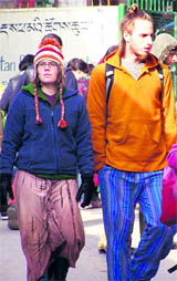 Foreign tourists enjoy a walk on a cold Sunday afternoon at McLeodganj.
