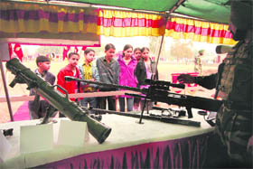 Visitors at an exhibition organised by the Crossed Swords Division in Akhnoor on Sunday