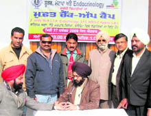 Dr Ramanbeer Singh during a medical camp organised by the Lions Club in Ludhiana on Sunday