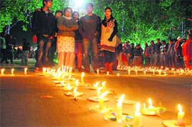 For a cause: People take part in a candle light vigil to protest against the quantum of sentence given to SPS Rathore in the Ruchika molestation case, in Sector 17, Chandigarh,