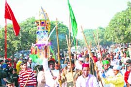 Devotees take part in a Tajia procession during Muharram in Sector 29, Chandigarh