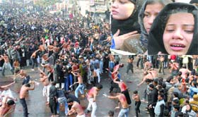 Shia Muslims mourn during a Mohurram procession in New Delhi