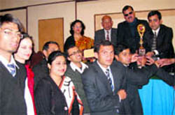 Mohit Agarwal,Chairman of Doon Business School with the award in Dehradun on Monday