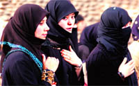 Women mourn during a procession in Jammu on Monday
