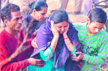 Grieving relatives of the victims in Ludhiana on Monday.