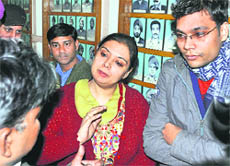 Employees of the Forever jewellery showroom during a press conference in Ludhiana on Monday.