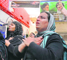 Women mourn during a Muharram procession in Amritsar on Monday.
