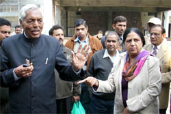 After the verbal duel, former SAD minister Charanji Lal Garg and deputy mayor Gurwinder Pal Kaur Mangat express their different versions in front of the media at the Bathinda Municipal Corporation on Tuesday. 