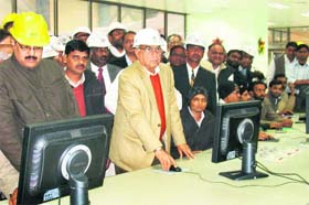 Chief Minister Bhupinder Singh Hooda synchronises the 600 MW unit of the Rajiv Gandhi Thermal Power Plant with the grid in Khedar near Hisar