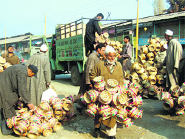 With chill tightening its grip all over the state, truckloads of Kangris are unloaded in Srinagar almost everyday.