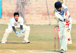 A match in progress in the First Invitation Cricket Cup Tournament (u-19) at MGM Public School, Dugri, in Ludhiana on Tuesday.