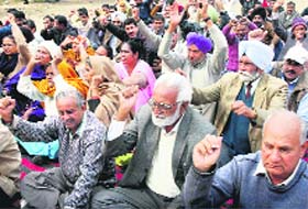 Activists of the city unit of the CPI protest against the administration for not allowing residents to hold dharna anywhere in the city, other than space earmarked in Sector 25, at Sector 20, Chandigarh
