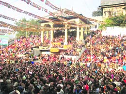 A view of the gathering at the state-level function addressed by Chief Minister PK Dhumal in Mandi on Wednesday. 