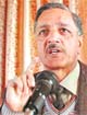 BJP spokesperson Ashok Kapatia addressing a press conference in Shimla on Wednesday.