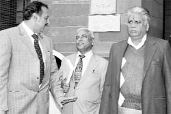 Lawyer in the Ruchika molestation case, Pankaj Bharadwaj, Ruchikas father SC Girhotra and her friend Aradhanas father Anand Prakash come out after meeting Union Home Minister P Chidambaram in New Delhi on Wednesday