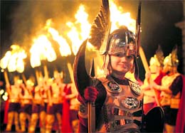 A torchlight procession and celebrants wearing Viking costume light up Edinburghs main street, the Royal Mile, to mark the beginning of Hogmanay, five days of concerts and events to celebrate the Scottish New Year.