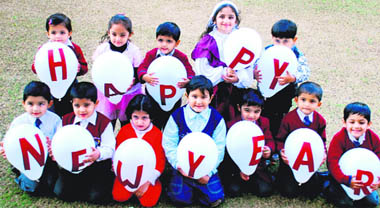 Kids strike a pose to usher in the New Year