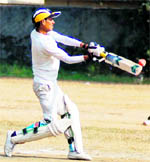 A batsman plays the pull shot in the U-17 District Cricket League at Col. Brown School in Dehradun on Thursday