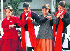 Girls perform at an NSS camp in Dehradun on Thursday