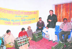 Devendra Dhyani , a Block Development Committee member, explains to the beneficiaries about various schemes of the Khadi Board in Pauri Garhwal district.