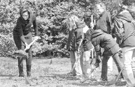 Michelle Obama and her family tending to their garden at the White House.