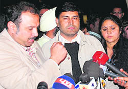 Ashu, brother of Ruchika, along with his wife interacts with mediapersons at the SP office in Panchkula on Thursday.