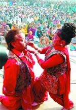 Artistes perform during a New Year function inside Central Jail in Amritsar