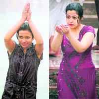 Girls offer water to Sun God in Haridwar on the first day of 2010 on Friday in view of a lunar eclipse observed last night.
