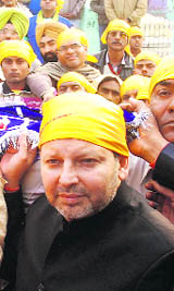 Member of Parliament Arvind Sharma pays obeisance at the Bu-Ali-Shah Kalander shrine in Karnal on Friday. 