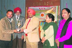 ADC Kuldip Singh gives away prizes on the concluding day of an NSS camp at SCD Government College for Boys in Ludhiana