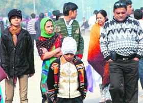 Biting cold was no deterrent to tourists who came out in large numbers to visit Sukhna Lake in Chandigarh on Saturday.