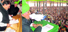 INLD candidate Abhey Chautala takes oath while filing his nomination papers; and (right) former Chief Minister Om Prakash Chautala addresses a rally in Ellenabad on Saturday.