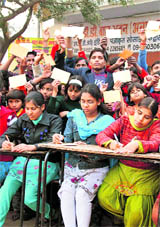 Children of MDD orphanage write letters to UPA chairperson Sonia Gandhi to set up Kalpana Chawla medical college in Karnal on Saturday.